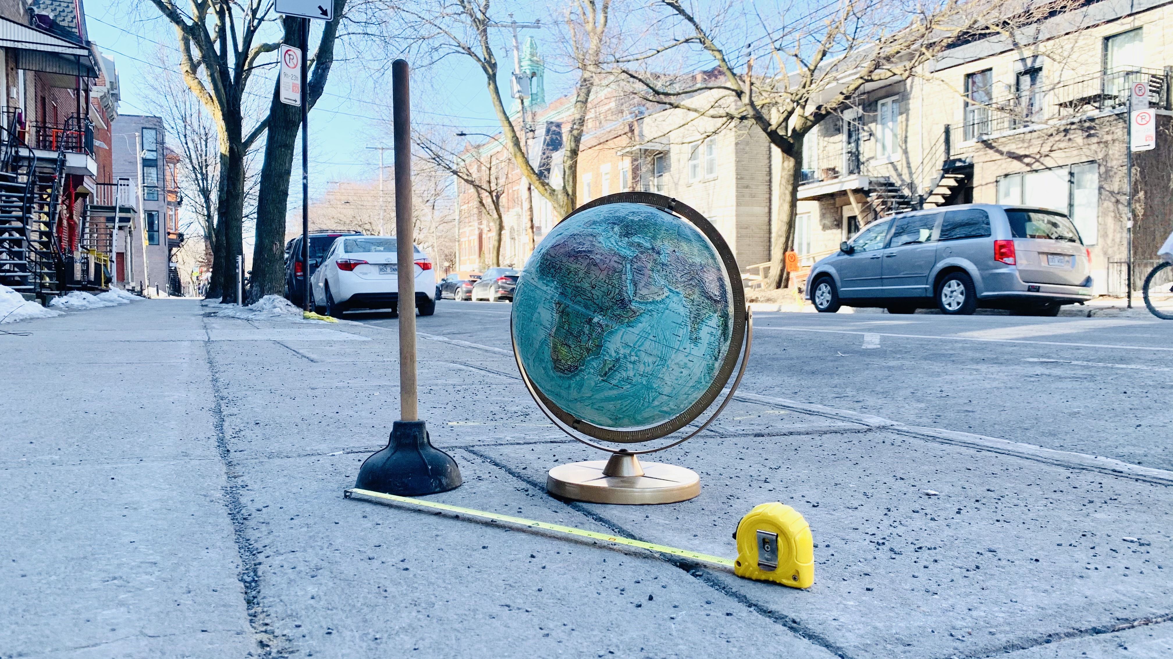 Globe, plunger, tape measure