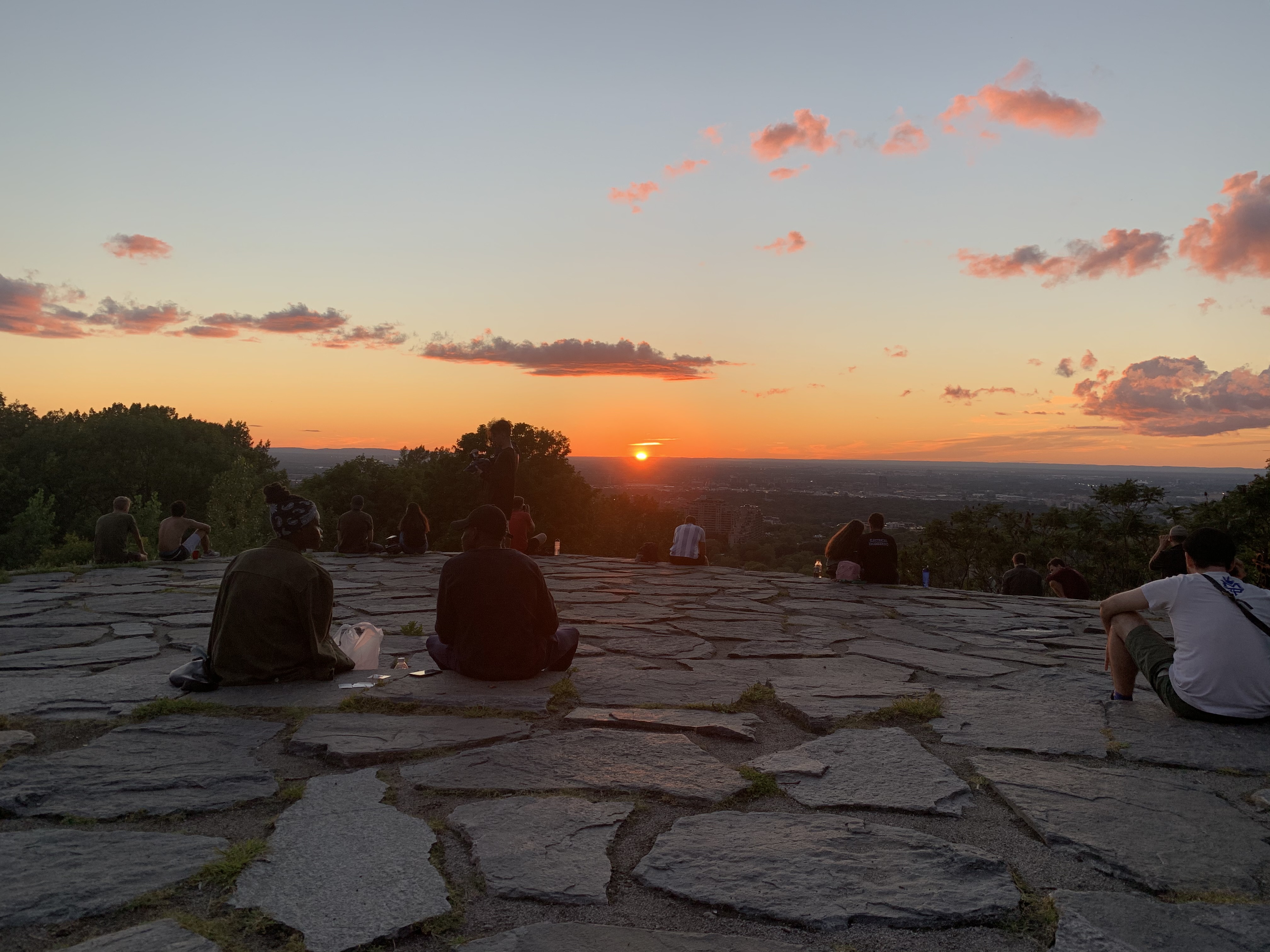 Sunset with a few clouds above the horizon
